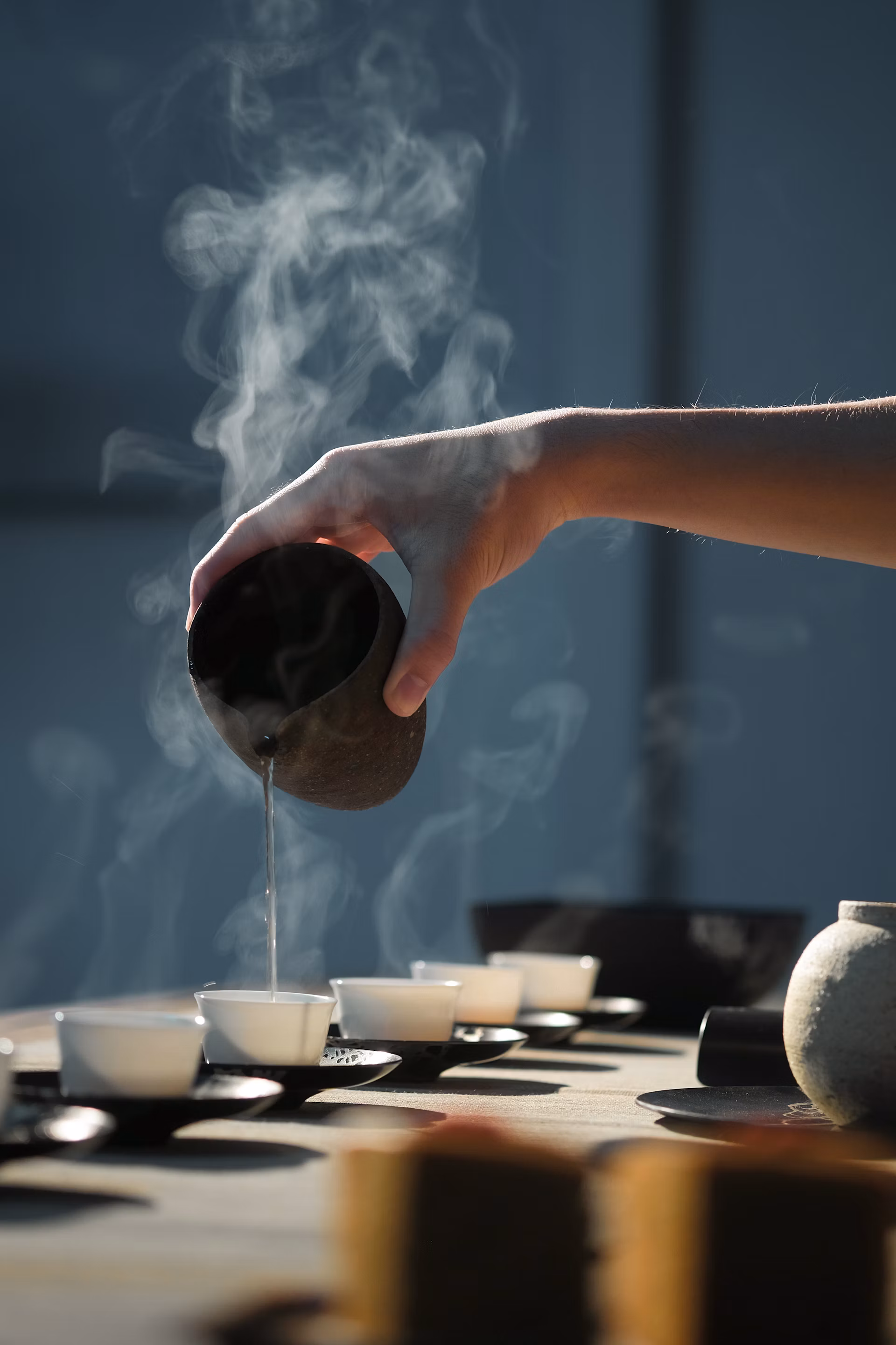 Water being poured over tea leaves